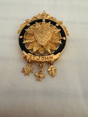 St. John Gold and Black Heraldic Shield Brooch with Dangles